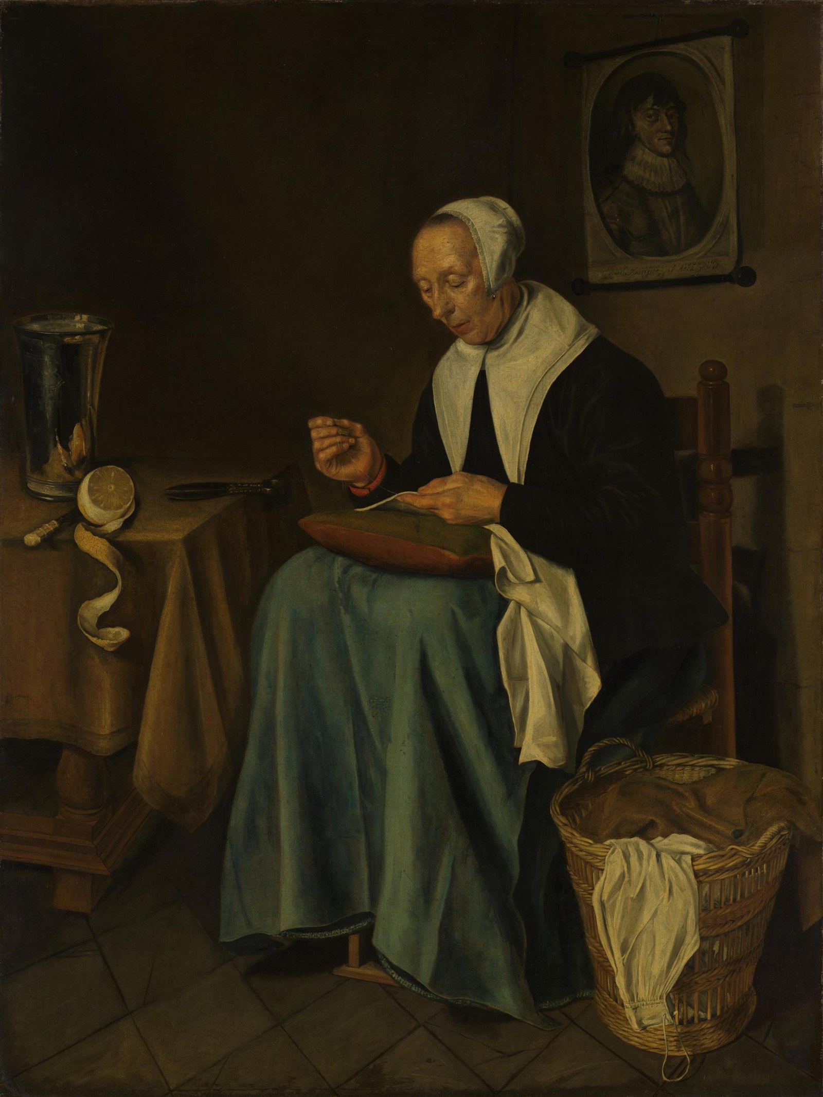 An Old Woman seated sewing