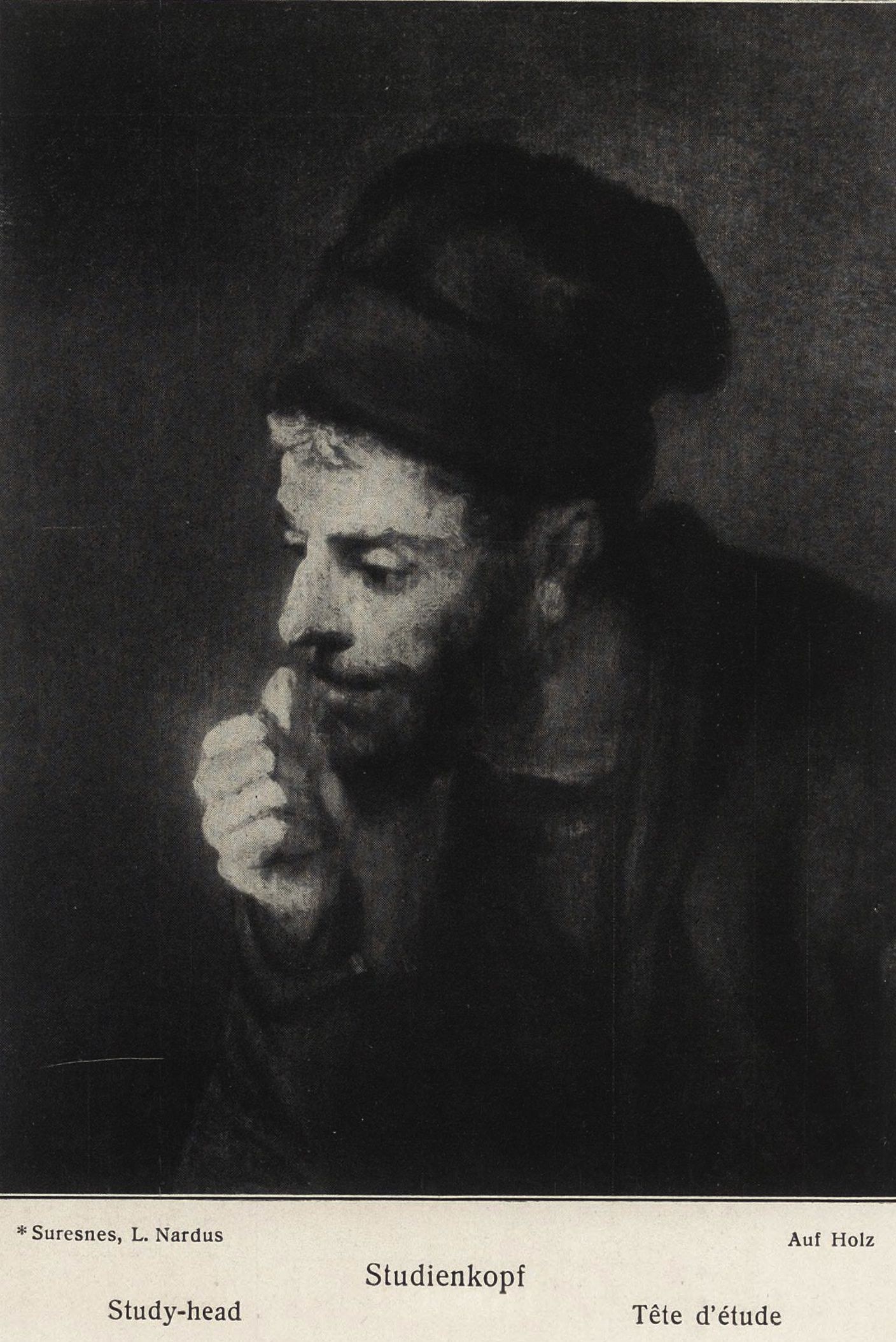 Man in a Beret looking Left showing a Fist