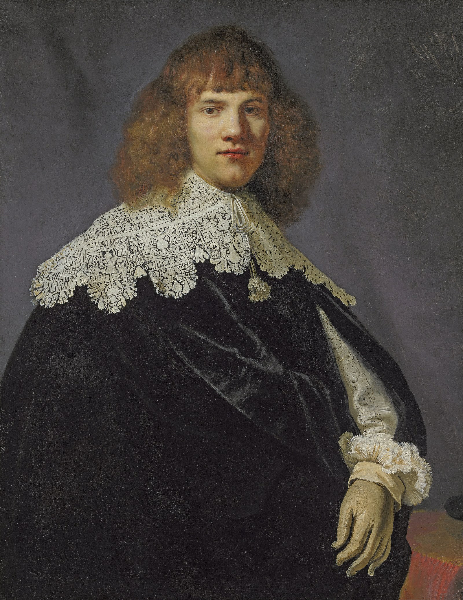 Portrait of a gentleman, half-length, in a black velvet cloak and white lace collar and cuffs