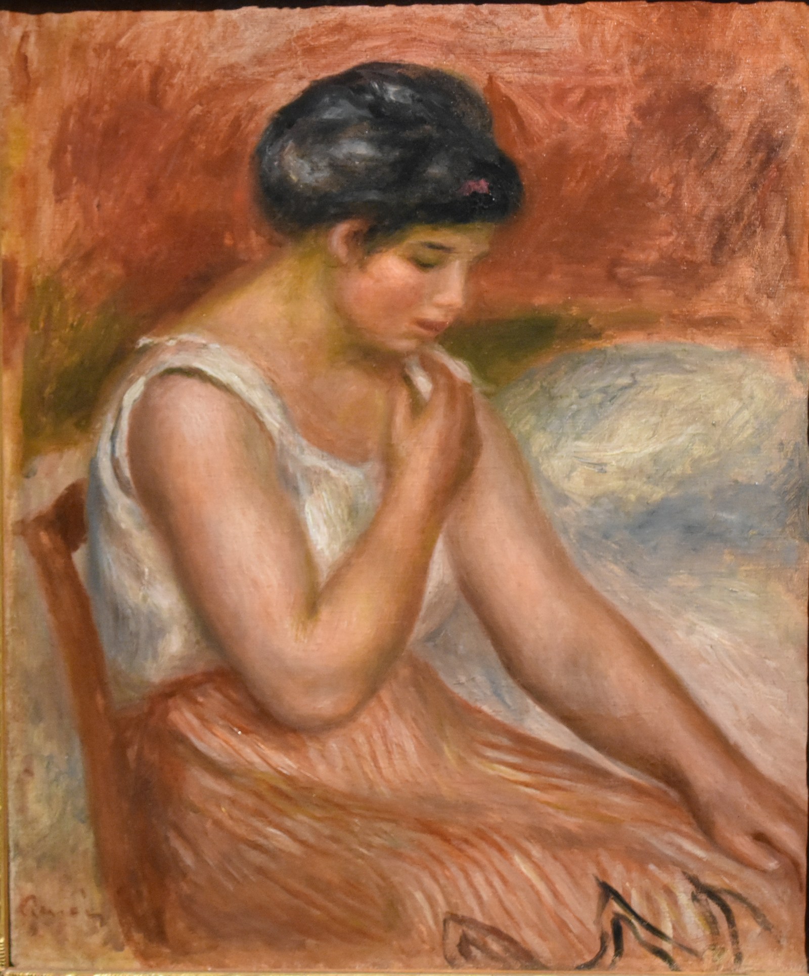 Seated Girl in striped Skirt