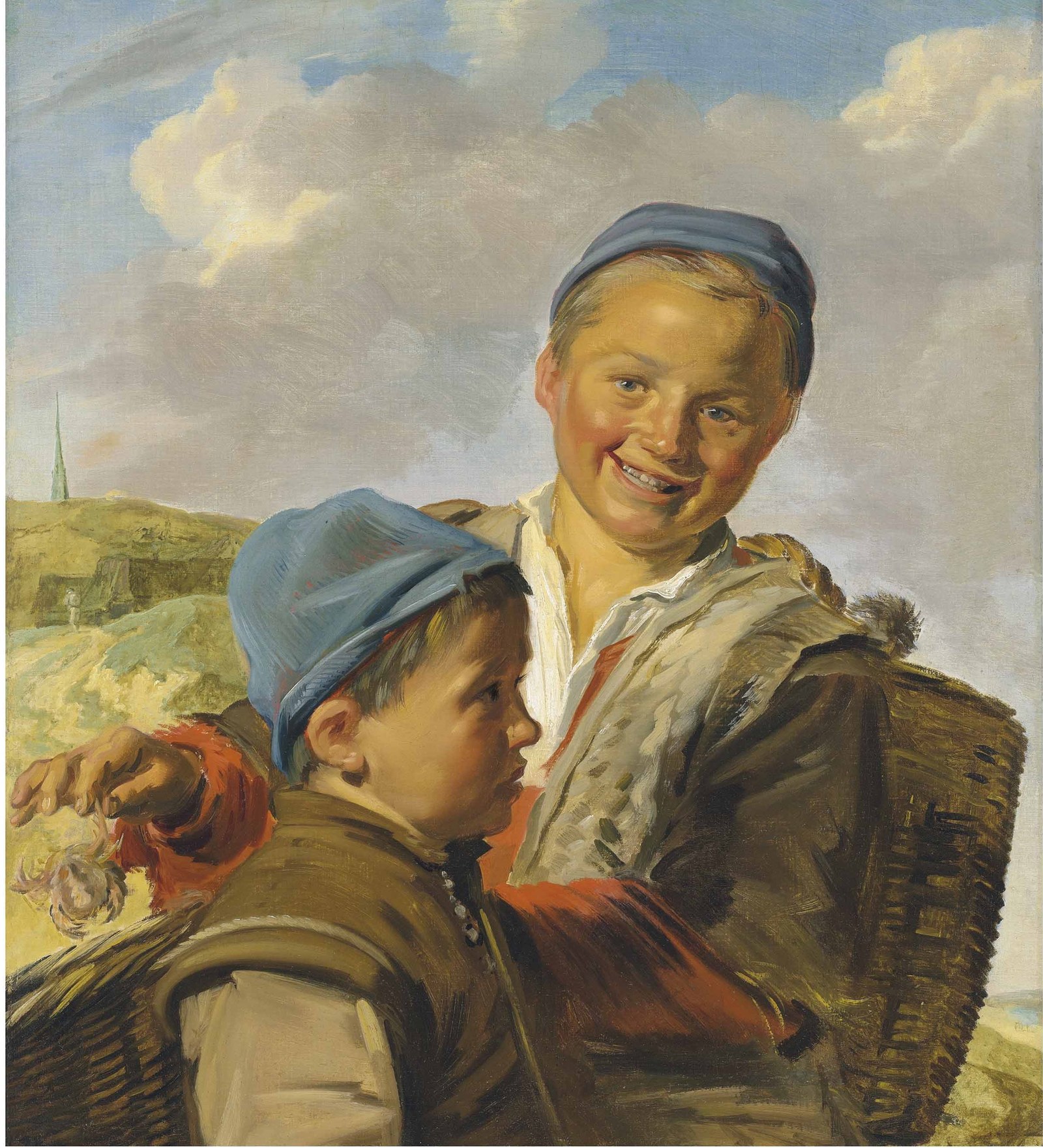 Portrait of two fisherboys with one holding a crab
