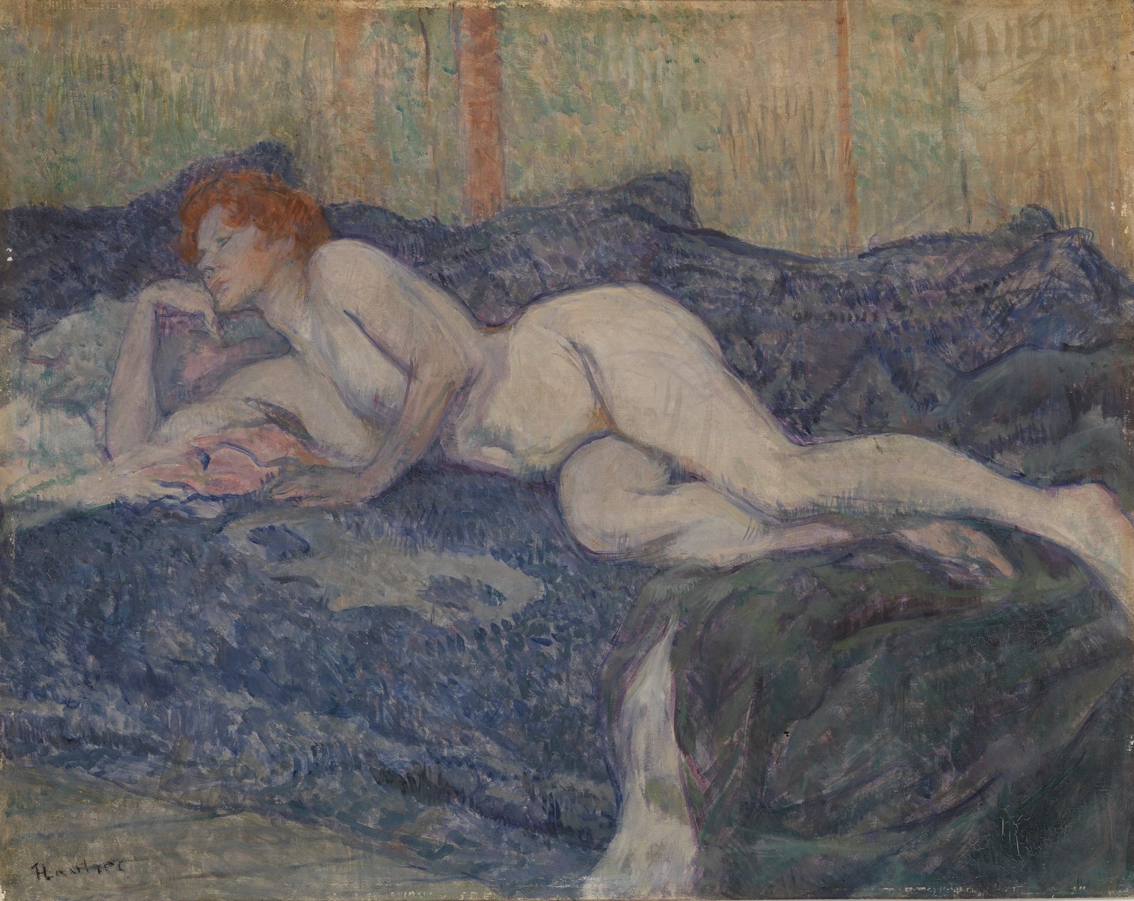 Naked woman stretched on a couch