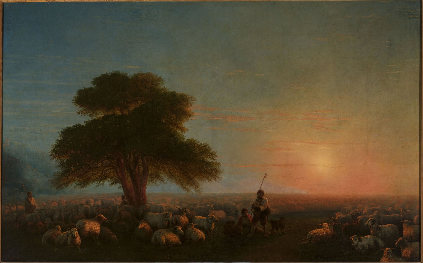 Shepherds with a flock of sheep.