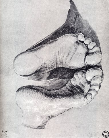 feet Of A Kneeling Man