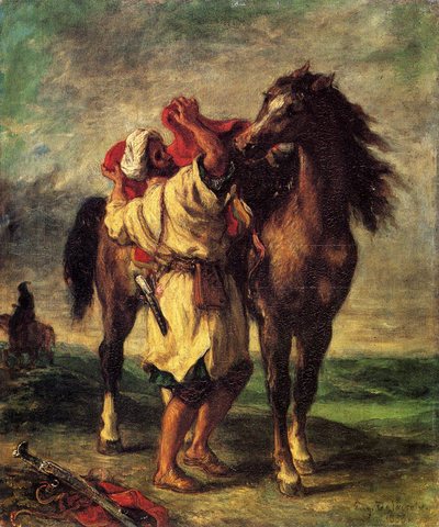 Ferdinand Victor Eugene A Moroccan Saddling A Horse