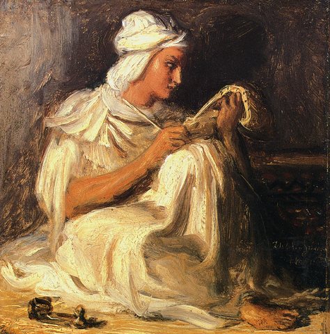 Young Teleb seated