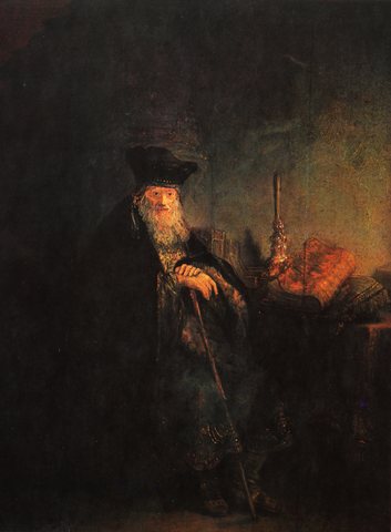 Old scholar in a study