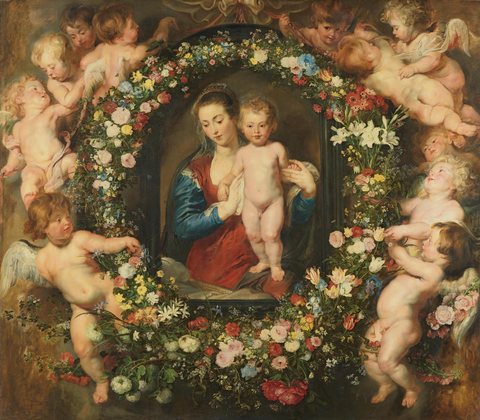 Madonna in floral wreath.