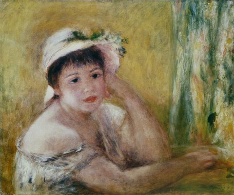 Woman wearing a straw hat