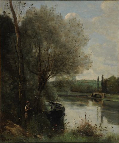 The reader by the wooded bank