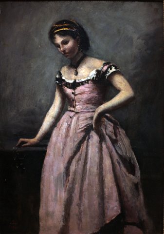 Young woman in pink dress