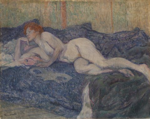 Naked woman stretched on a couch