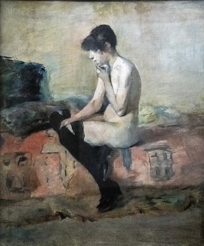 Nude study. Woman sitting on a couch