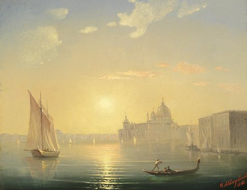 The Canal Grande with a view of Santa Maria della Salute at sunset.