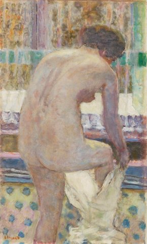 Nude getting dressed