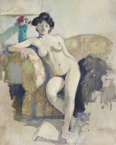 Nude woman sitting on a sofa