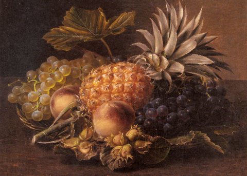 Grapes a Pineapple Peaches and Hazelnuts In A Basket